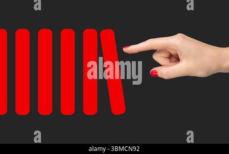Risk management in business, evaluating obstacles and avoiding crisis or bankruptcy. Hand making strategic decisions to prevent disaster, using analys Stock Photo