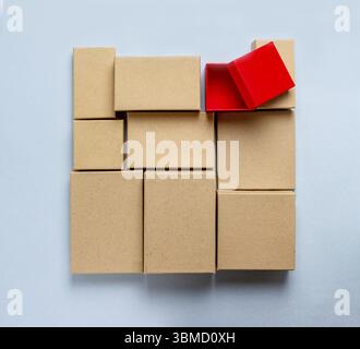 Red and brown cardboard boxes on a blue background, mock-up, boxing day Stock Photo
