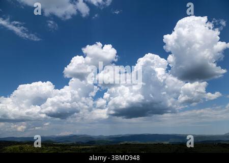 Cumulus clouds forming prior to a storm, Bulgaria Stock Photo