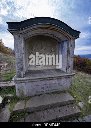 13th station of the Way of the Cross from Kreuzberg Monastery to Kreuzberg Mountain in the Rhoen, Jesus is taken down from the cross, Bischofsheim i.d Stock Photo
