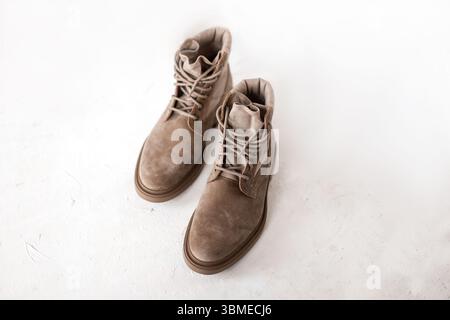Top View Of Fashionable Beige Suede Men's Lace-up Boots Made Of Quality Materials. New Stylish Autumn-winter Collection. Details Of Everyday Look. Stock Photo