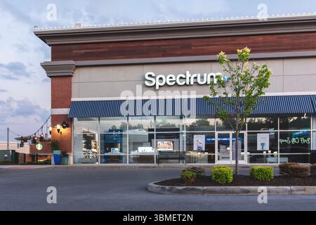New Hartford, NY - Jun 24, 2025: View of Spectrum, operating under Charter Communications, is a broadband and cable operator, emerged after the Time W Stock Photo