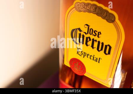 Mexico City, MEXICO - Dec 6 2024 : Macro image of Jose Cuervo Especial tequila bottle label with warm lighting. Stock Photo