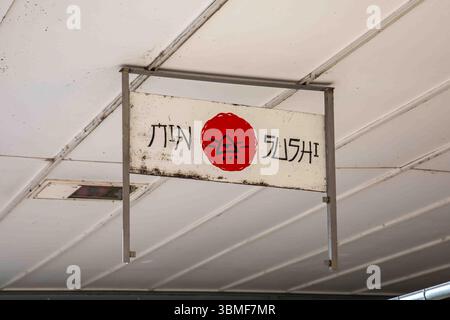 Min Sushi restaurant sign at deserted shopping center before demolition in Lehtisaari district of Helsinki, Finland Stock Photo