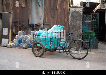 Old Bicycle Loaded With Empty Drinking Water Bottles, Plastic Canister Reuse, Rickshaw Transportation, Recycling, Environmental Issue, Mubai, India, 0 Stock Photo