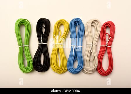 Coils of multicolored wires. Connecting wires for electronics. Stock Photo