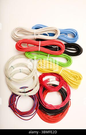 Coils of multicolored wires. Connecting wires for electronics. Stock Photo