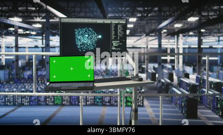 Industrial platform workstation in automated data center displaying deep learning code on isolated screen laptop. Server room mockup notebook running AI models monitoring operational stability Stock Photo