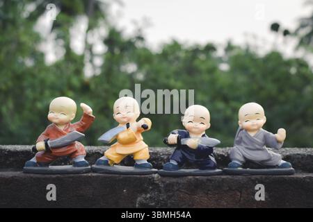 Cute superman superhero batman superman fantasy toy doll. Robotic alien fictional character adventure background. Part of series. Close up portrait. O Stock Photo