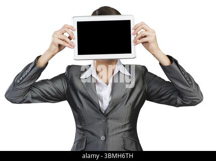 Portrait of woman covering her face with tablet computer. Businesswoman showing tablet PC with blank screen. Corporate businessperson isolated on whit Stock Photo