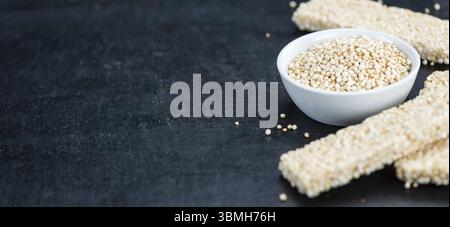 Some Quinoa Bars on a slate slab (close-up shot, selective focus) Stock Photo