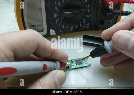 Repair of electronics and computer equipment. Multimeter Stock Photo