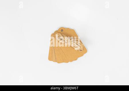 Set of Brown Kraft Tags with Jute String for Gifts or Crafts Stock Photo