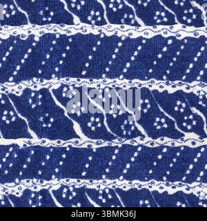 Seamless 4k photo texture of blue colored ornate floral patterned cotton material. Stock Photo
