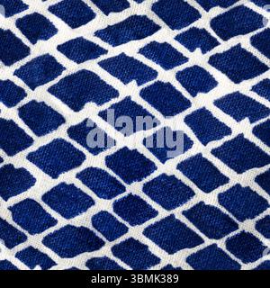 Seamless 4k texture material of blue colored cotton cloth with mesh, scale or square print. Stock Photo