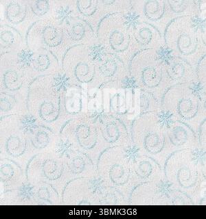 Seamless 4k photo texture of white polyester cloth with winter ornate blue colored glitter pattern. Stock Photo