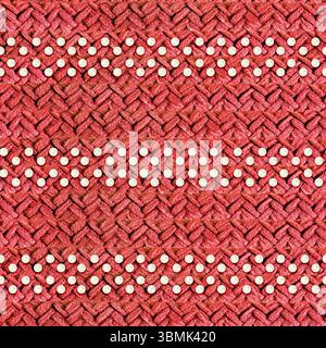 Seamless 4k photo texture of coral colored woven knitted patterned material with white beads ornament. Stock Photo
