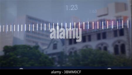 Audio waveform image over blurred city buildings and trees in background Stock Photo