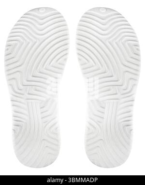 Isolated photo of white colored rubber slippers protector on white background. Stock Photo