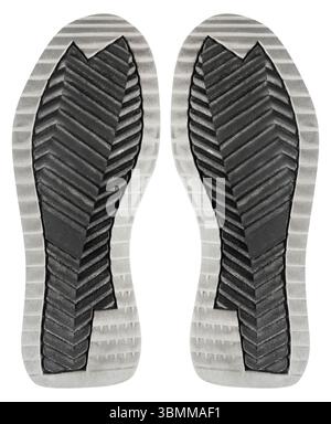 Isolated photo of gray colored sneakers or shoe rubber protector on white background. Stock Photo
