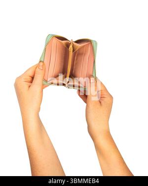 Isolated photo of woman hands holding an empty wallet on white background. Stock Photo