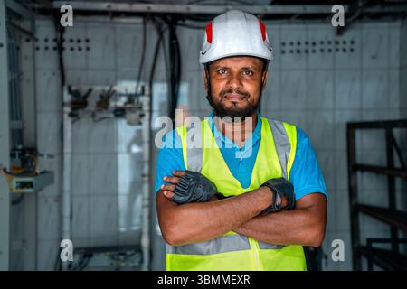 Technician and engineer team fixing network devices, routers, configuring servers, and repairing cables in network room. IT maintenance Stock Photo