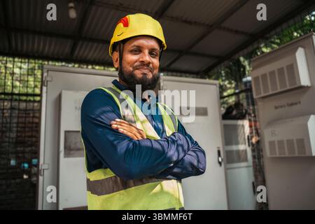 Technician and engineer team fixing network devices, routers, configuring servers, and repairing cables in network room. IT maintenance Stock Photo