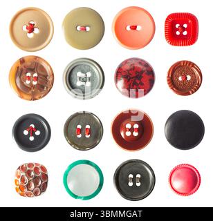 Isolated photo of various style and type cloth buttons with threads on white background. Stock Photo