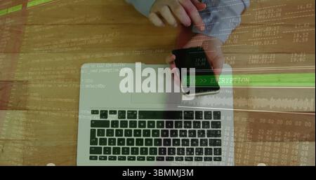 Typing developer hands entering code at home workstation, with laptop smartphone encryption overlay Stock Photo