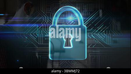 Displaying blue glowing padlock icon in virtual circuit board interface, with dark shirt silhouette Stock Photo