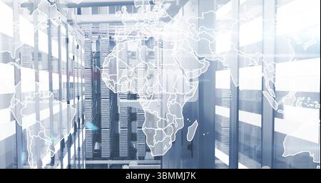 Data servers in modern facility with world map overlay image Stock Photo