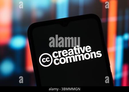 In this photo illustration, the Creative Commons (CC) logo is seen displayed on a smartphone screen. Stock Photo