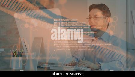 Typing on keyboard senior Japanese man wearing light blue shirt at office desk, with code overlay Stock Photo