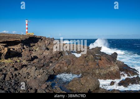 Rugged coastline at the Faro de Punta de Abona lighthouse, south coast, Tenerife, Canary Islands, Spain Stock Photo