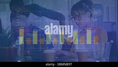 Reviewing team of five analyzing holographic financial charts in office, with laptop and coffee Stock Photo