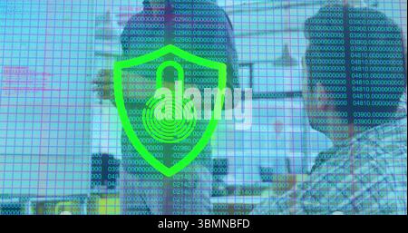 IT specialists monitoring network intrusions in office with headsets, shield icon and binary grid Stock Photo