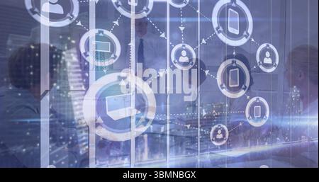 Six professionals collaborating around table in boardroom with glass walls, with interface icons Stock Photo