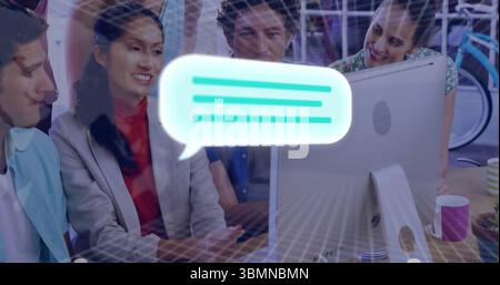 Leaning group of six coworkers collaborating around computer in office with coffee mugs and bicycle Stock Photo