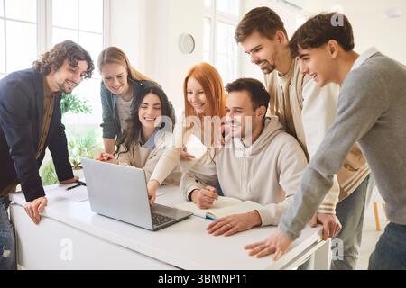 Young people discussing job project or new startup with brainstorming on workplace in office. Stock Photo