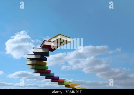 Books are floating in spiral staircase formation in flat vector style against blue sky with clouds Stock Photo