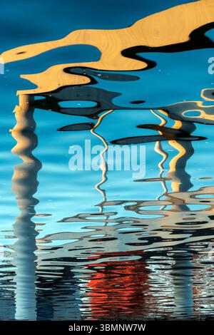 Abstract water reflection with vibrant colors and fluid shapes creating a mesmerizing pattern Stock Photo