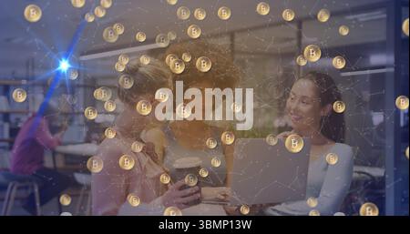 Collaborating three women reviewing crypto trends on laptop in modern workspace, Bitcoin overlay Stock Photo