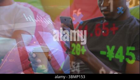 Analyzing financial overlays, two men sitting on cushioned lounge, holding coffee and smartphone Stock Photo