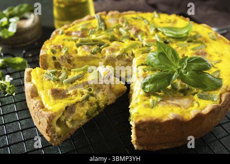 Ð¡lassic quiche Lorraine pie with tuna, green beans and soft cheese. Crustless quiche with eggs, fish and vegetables. Mediterranean ketogenic healthy Stock Photo