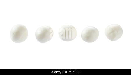 Baby mozzarella cheese balls isolated on a white background, clipping path and full depth of field. Stock Photo