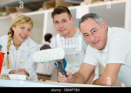 portrait of painter students with teacher Stock Photo