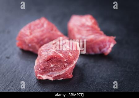 Chopped Beef Steak on a slate slab (selective focus, close-up shot) Stock Photo