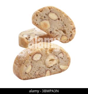 Delicious Italian style cantucci biscuits with almonds and hazelnuts isolated on white background. Sweet homemade cookies Stock Photo