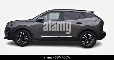 Studio shot of a brand new Peugeot 2008 SUV car, dark gray crossover vehicle, isolated on white background Stock Photo