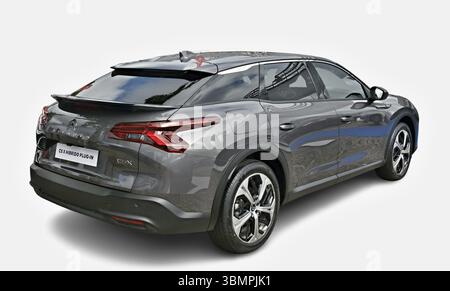 Citroen C5 X Hybrid shining in the sunlight, showcasing its elegant design and innovative plug-in hybrid technology Stock Photo